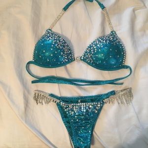 NWOT Turquoise competition swimsuit